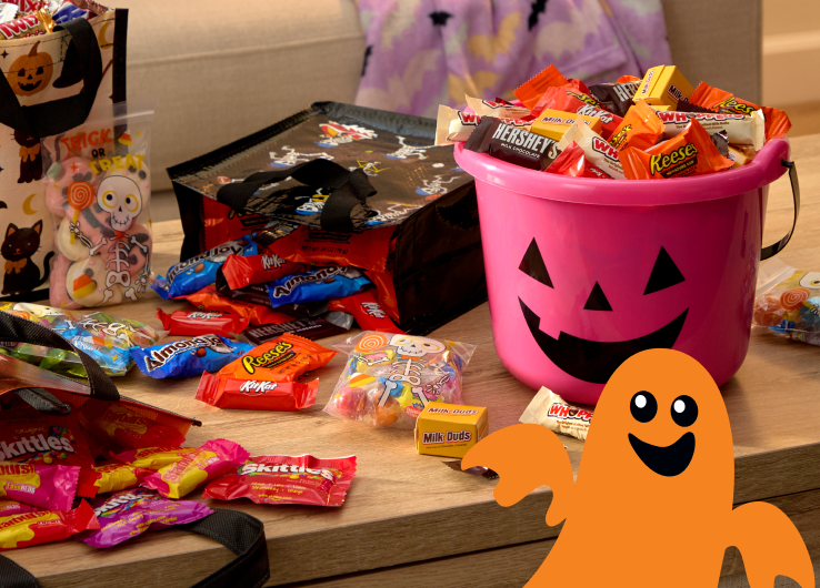 Trick or Treat and Happy Halloween candy buckets with popcorn treats and Halloween snacks