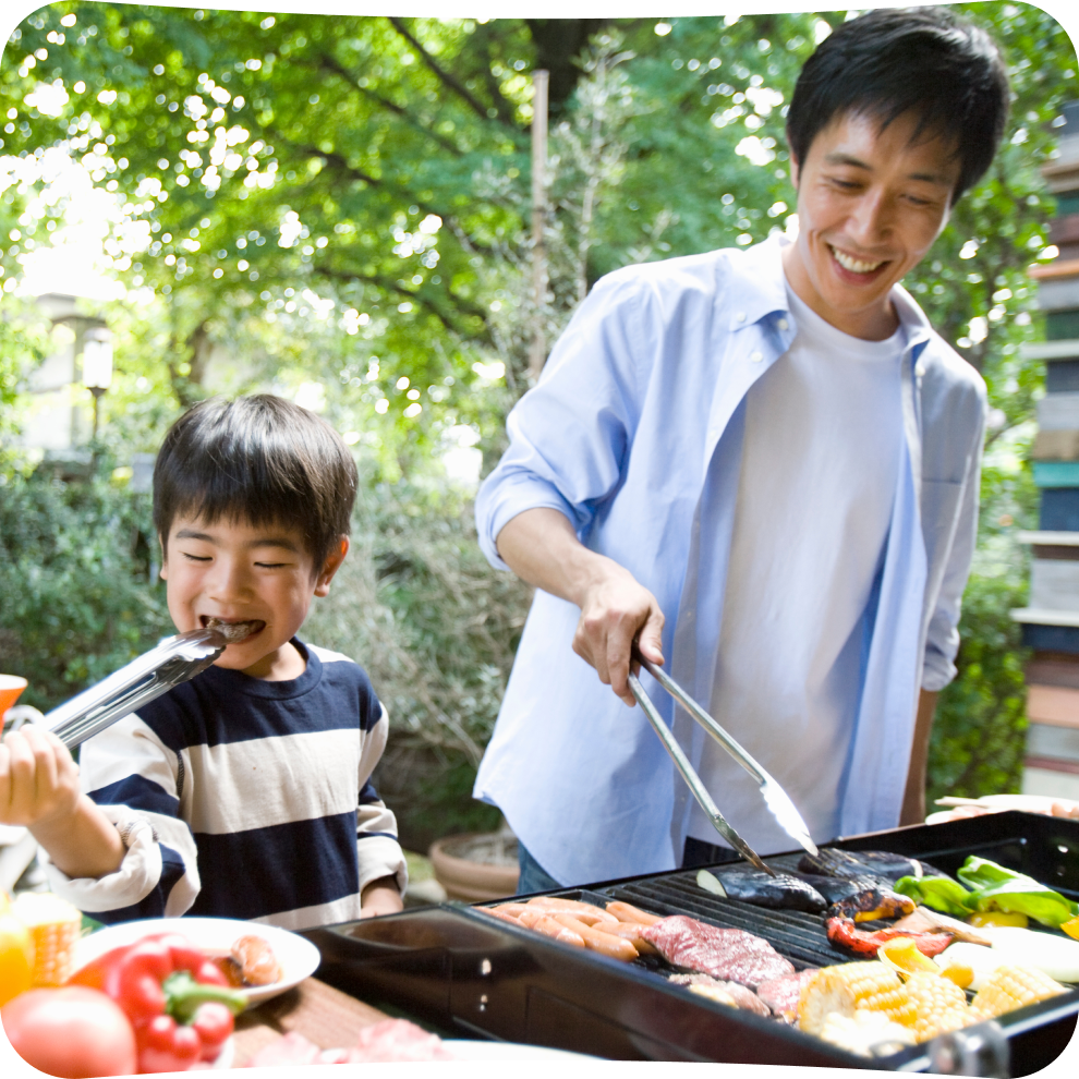 Dad holding toddler daughter