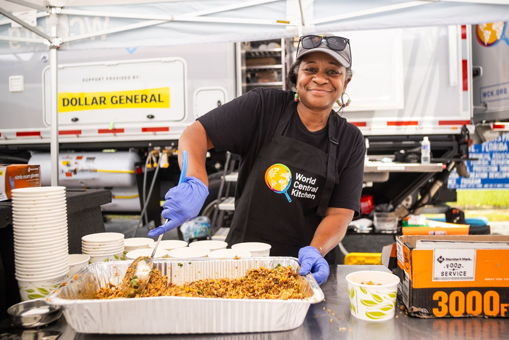 woman serving a meal