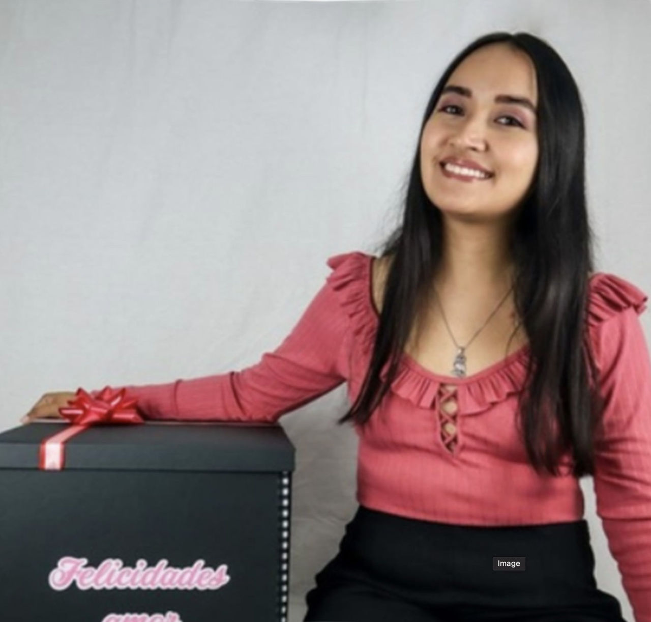 woman with a dark box