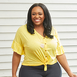 Woman in yellow front tie shirt for under $15