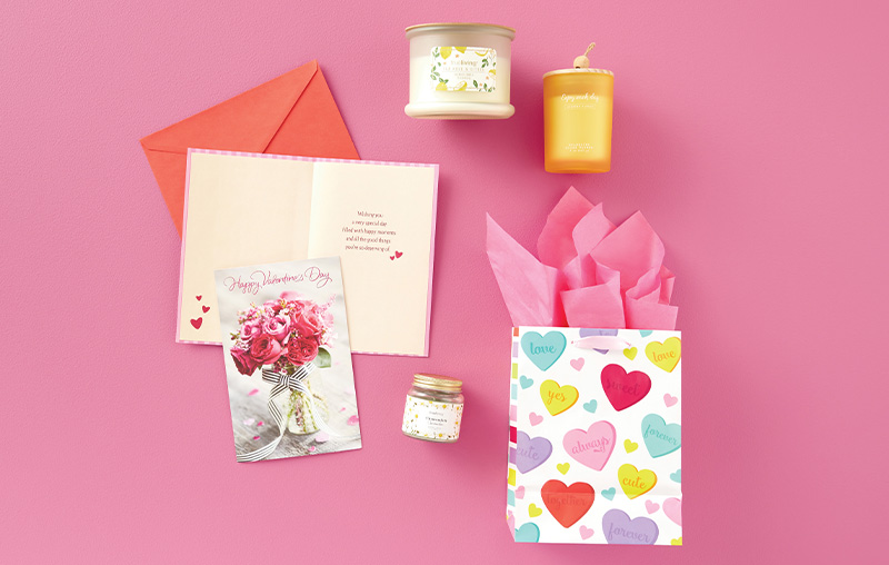 picture of valentines day gifts for teachers including gift bags, cards, and candles